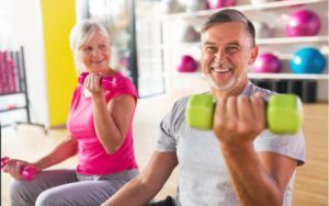 elderly couple excercising